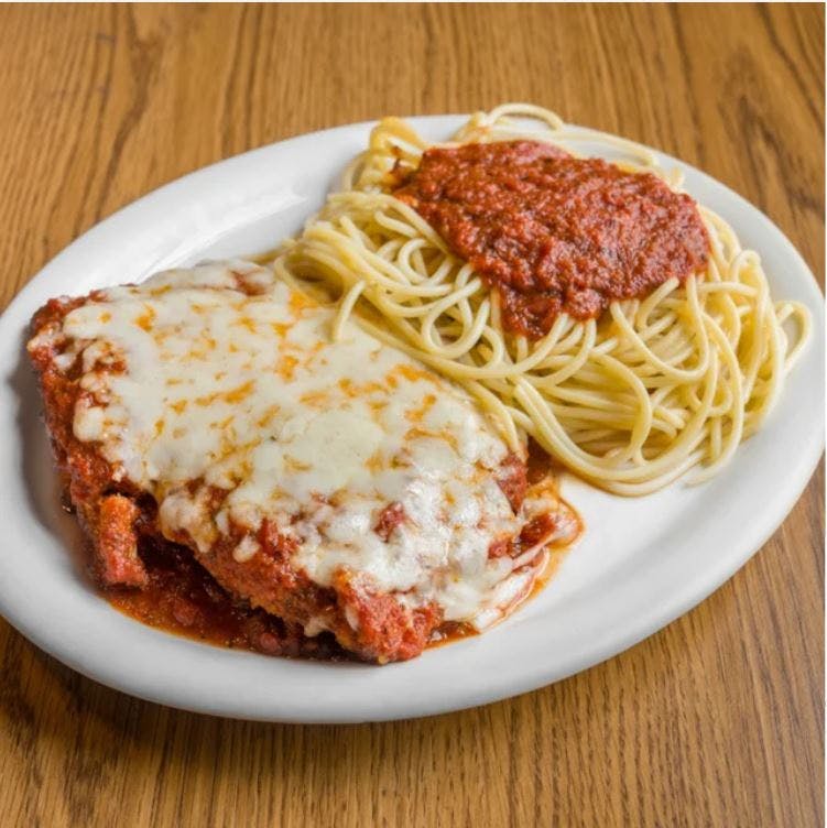 The Kitchen Italian Cafe and Pizzeria signature dishes BBQ Chicken PizzaPenne with Pink SauceChicken ParmesanGarlic Knots
